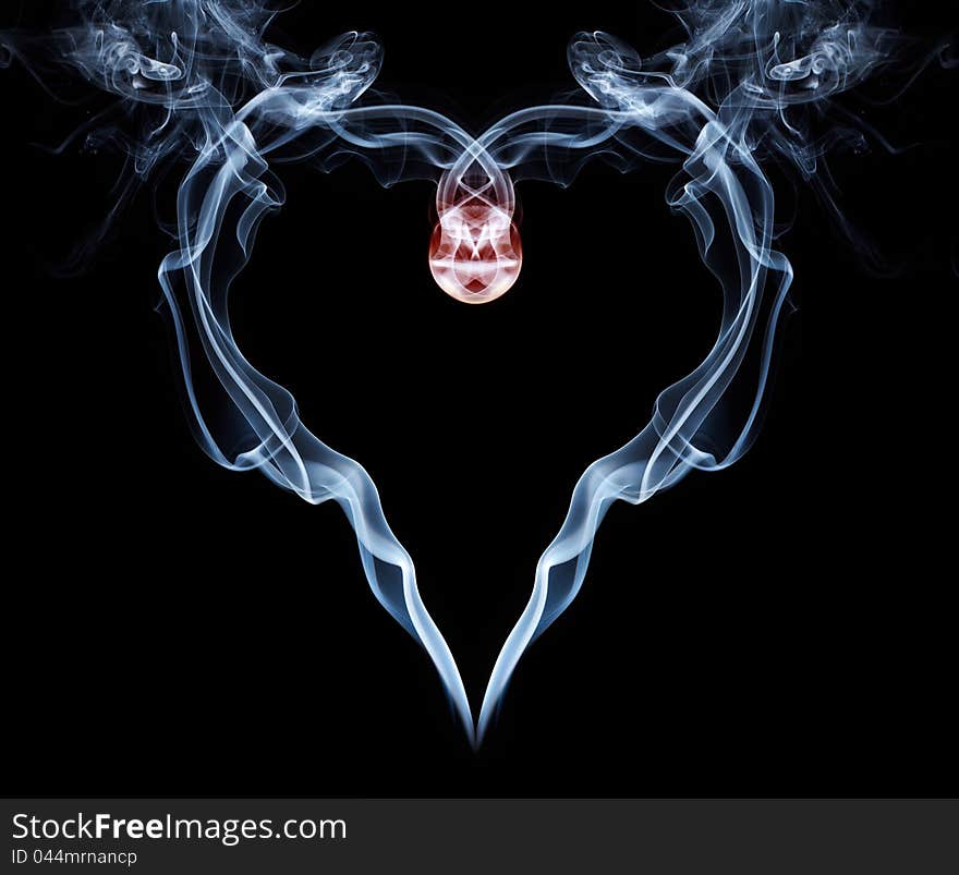 Smoke heart as a symbol of fragile nature of love. Smoke heart as a symbol of fragile nature of love