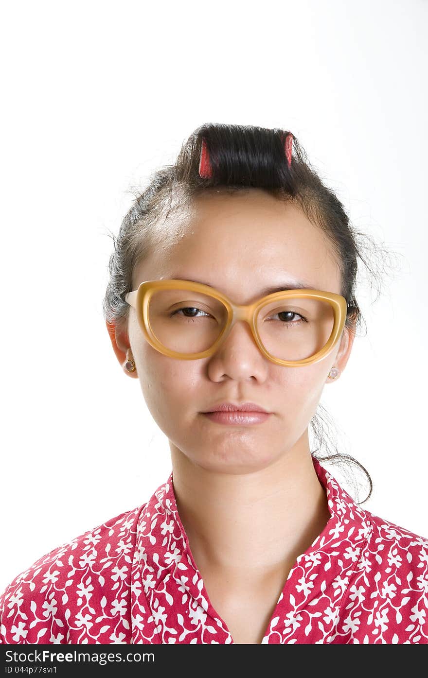 Young Girl In Curlers And Large Glasses