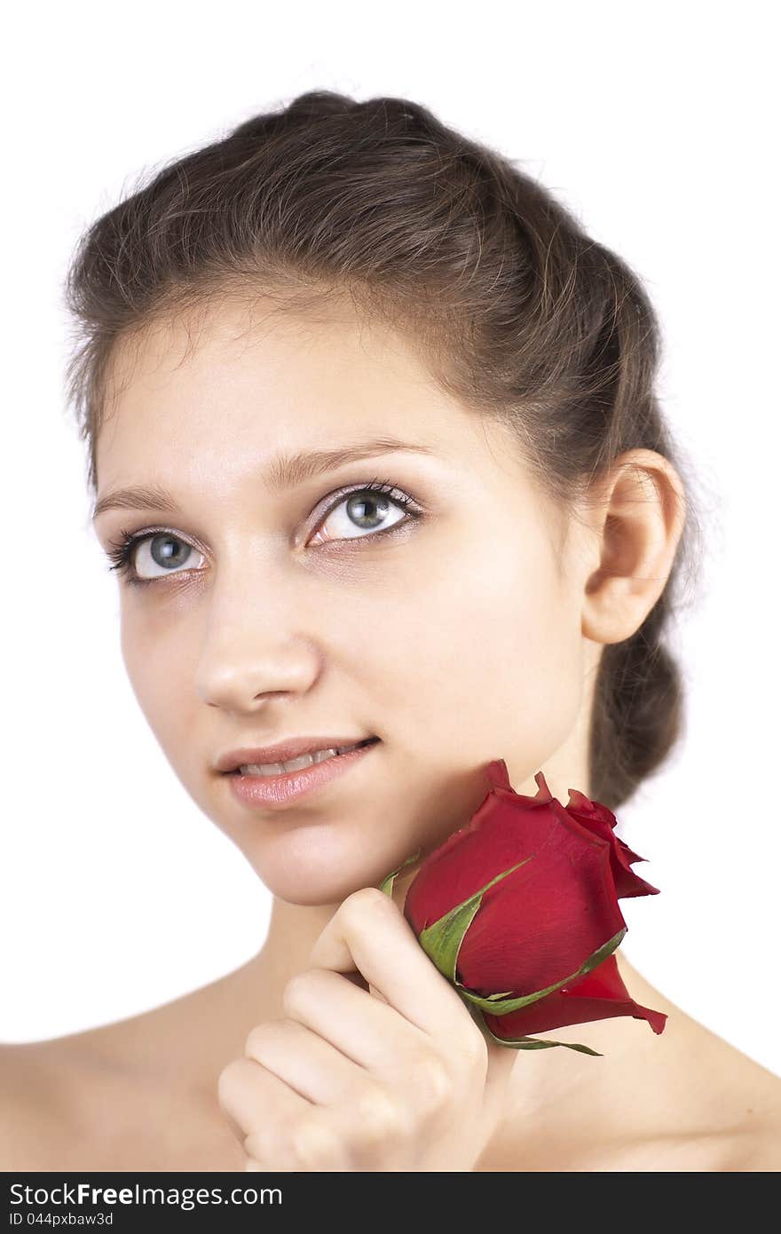 Young beautiful girl with red flower isolated on a white background