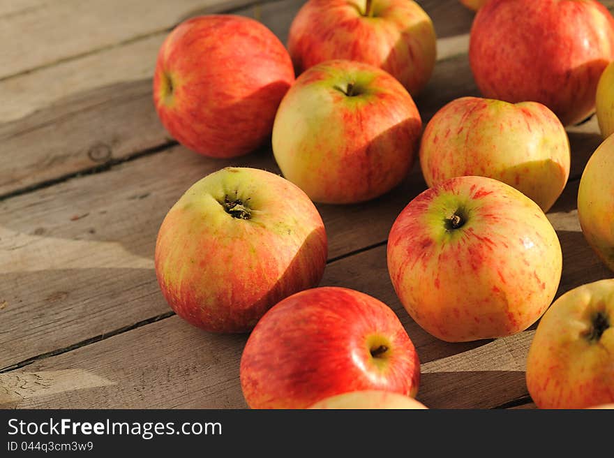 Apples on wood surface close up. Apples on wood surface close up