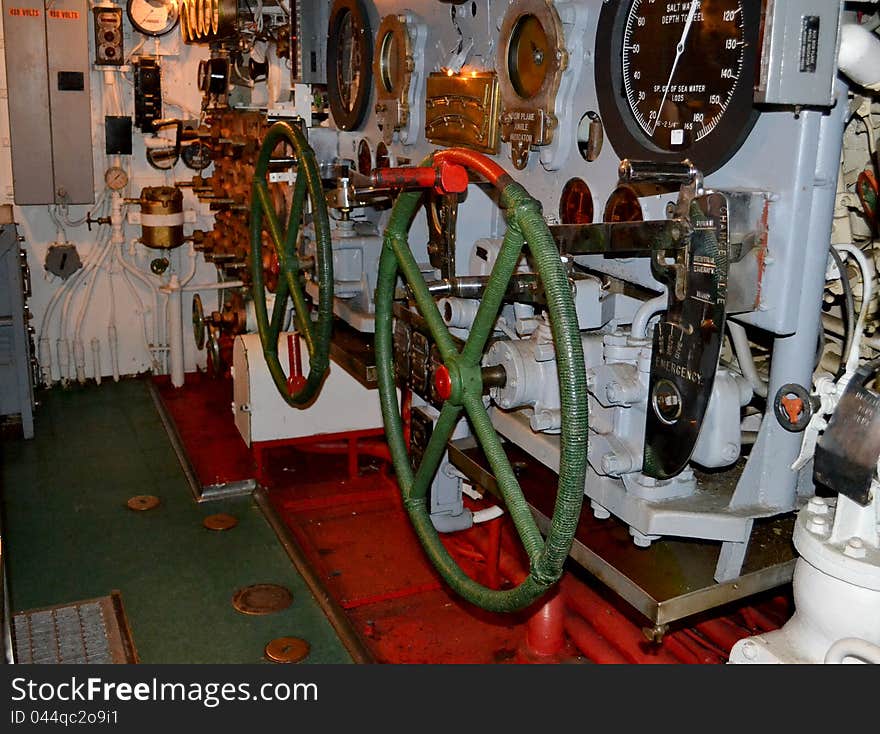 The USS Batfish is a Balao-class submarine that sank nine Japanese ships during the Second World War. The ship is located at the Muskogee War Memorial Park in Muskogee, Oklahoma. Pictured is the interior of the steering room.