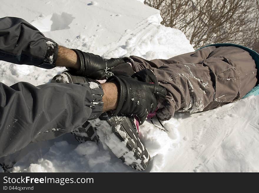 Hands holding a set of feet to pull them up. Hands holding a set of feet to pull them up