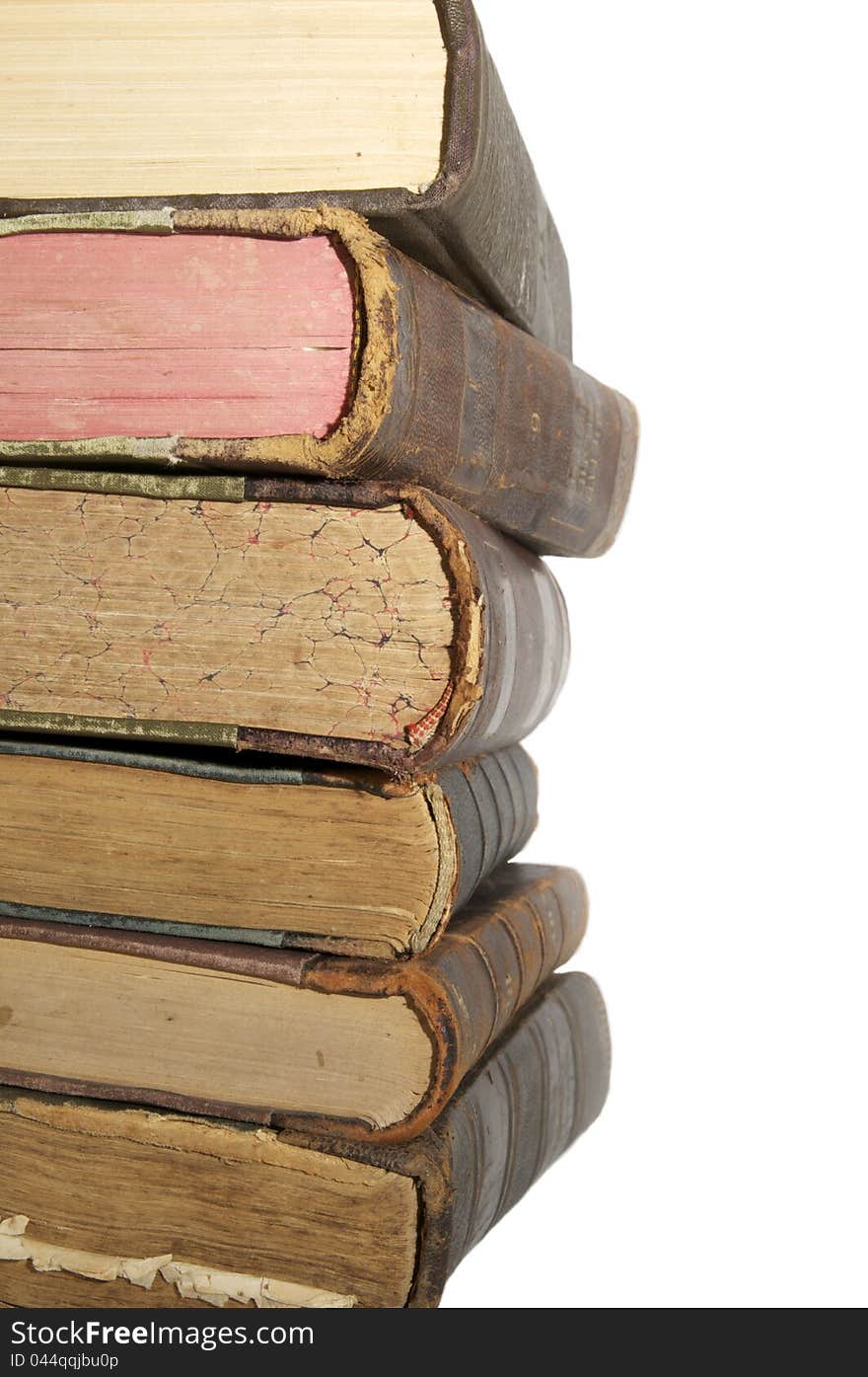 A very old book shot in close-up on a white background