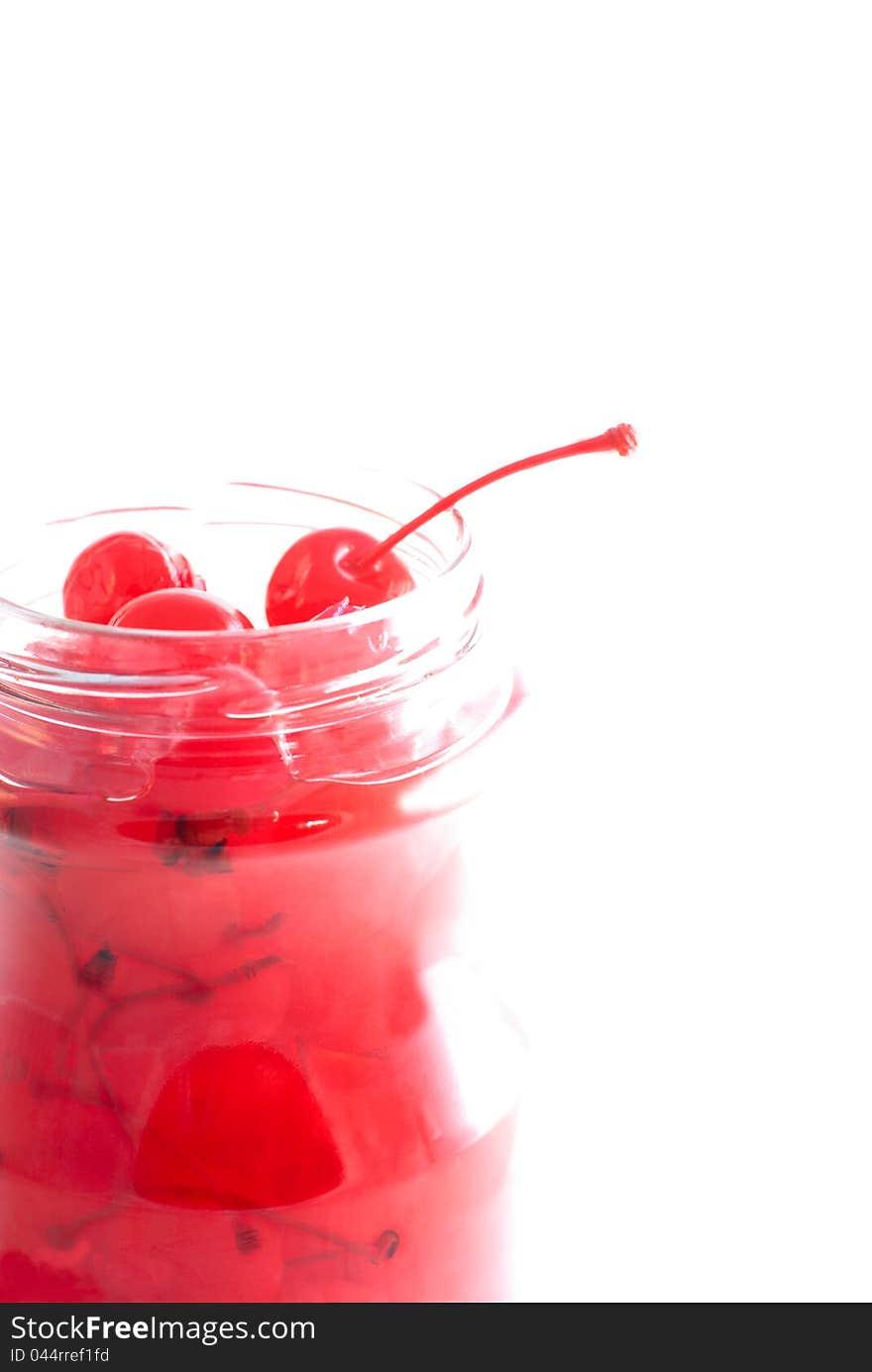 Cocktail cherries in glass jar. Cocktail cherries in glass jar.