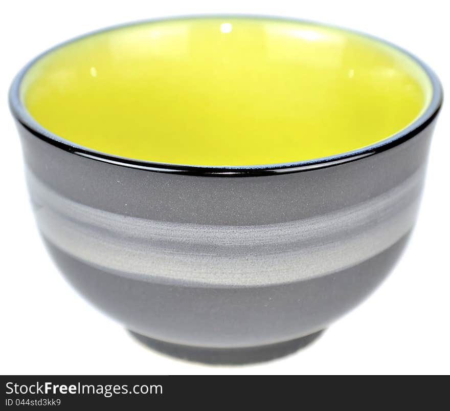 An empty Chinese tea bowl isolated on a white background