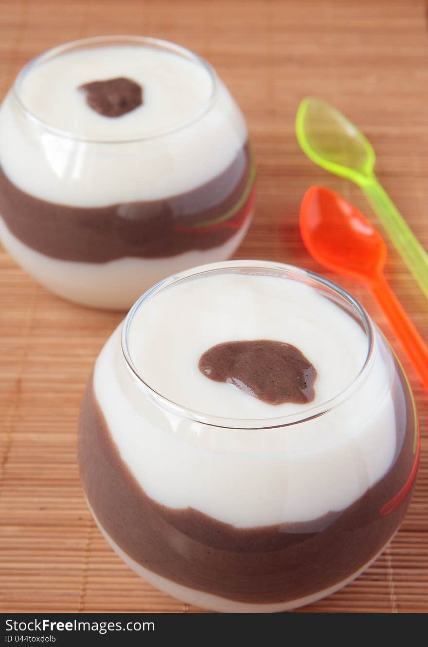 Two glasses of milk-chocolate dessert