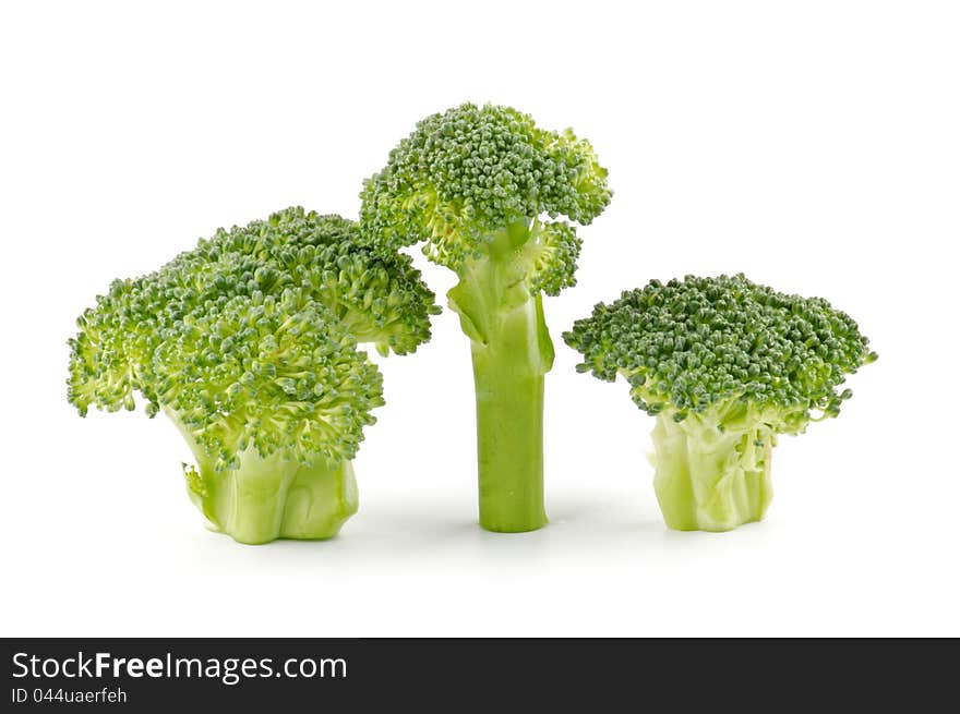 Three broccoli florets isolated on white background