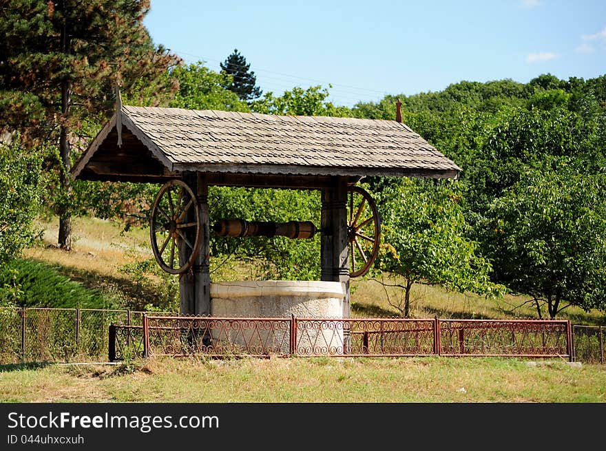 Old fountain near a forest