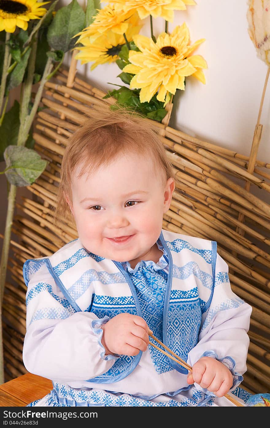 Little Girl in the Ukrainian national costume smiling. Little Girl in the Ukrainian national costume smiling