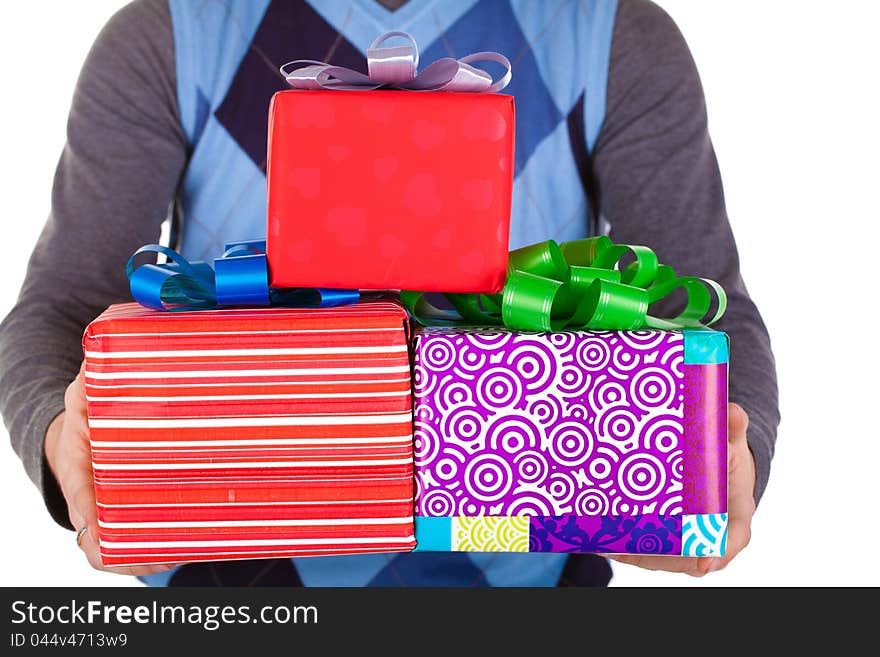 Present gift holding man looking camera. Present gift holding man looking camera