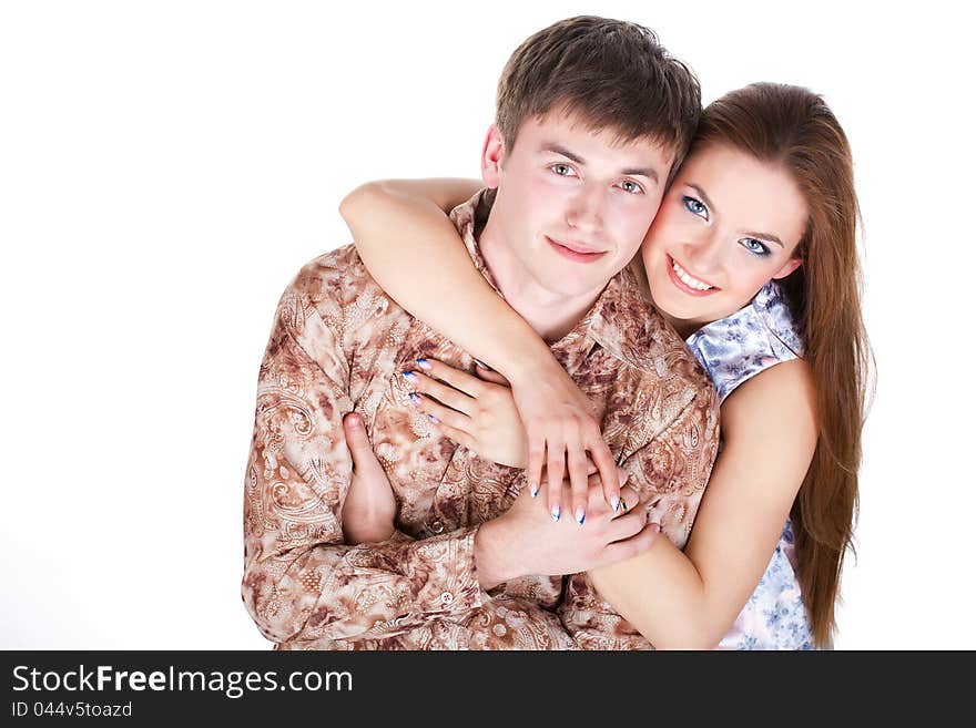 Loving couple embracing isolated studio