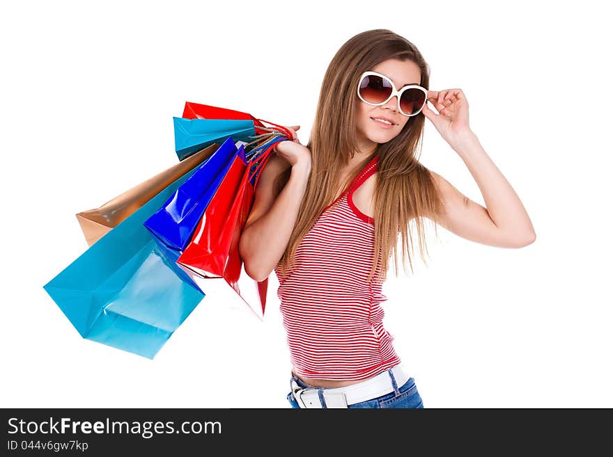 Young beautiful woman holding shopping bags isolated. Young beautiful woman holding shopping bags isolated