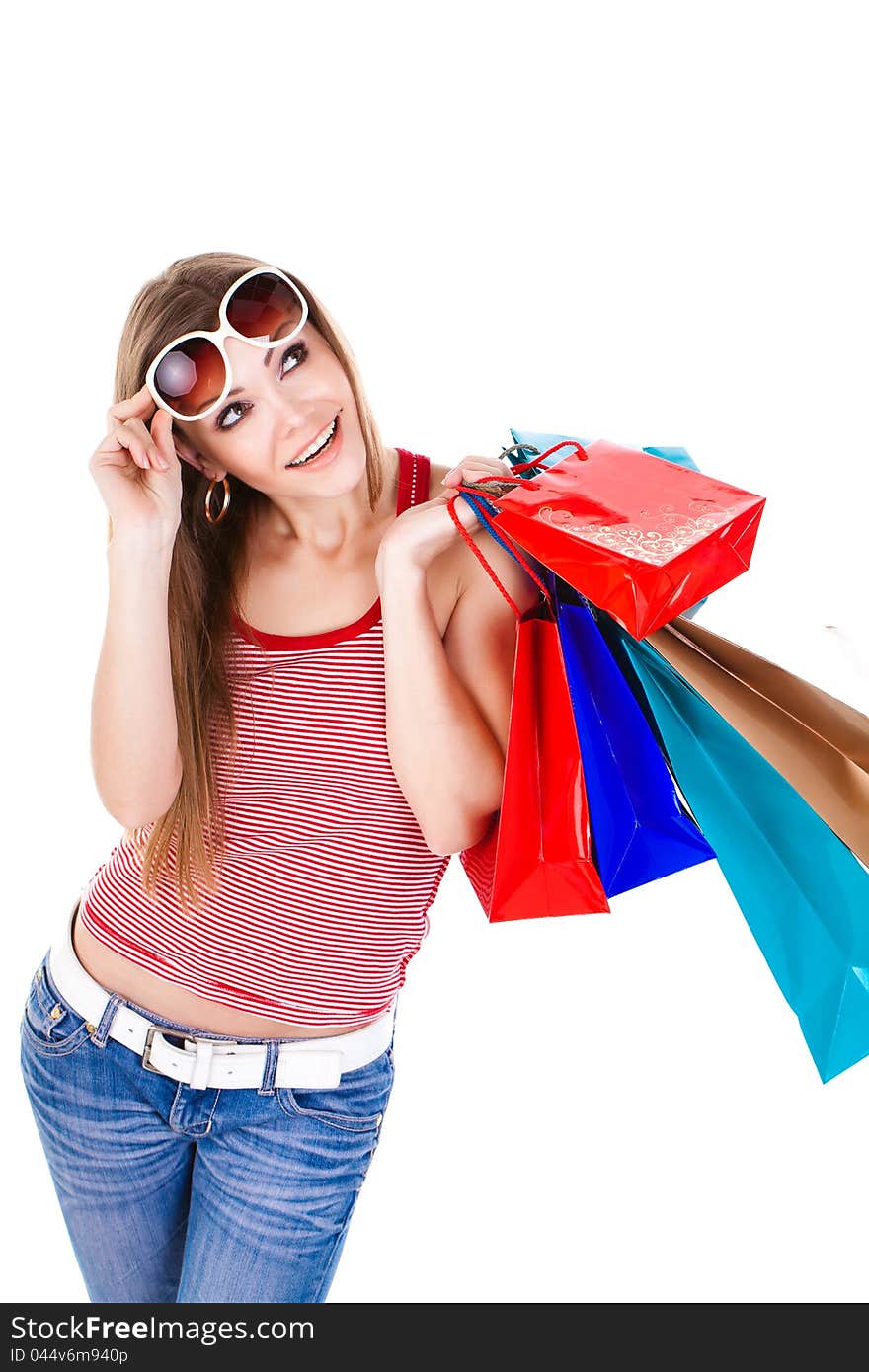 Young beautiful woman holding shopping bags isolated. Young beautiful woman holding shopping bags isolated