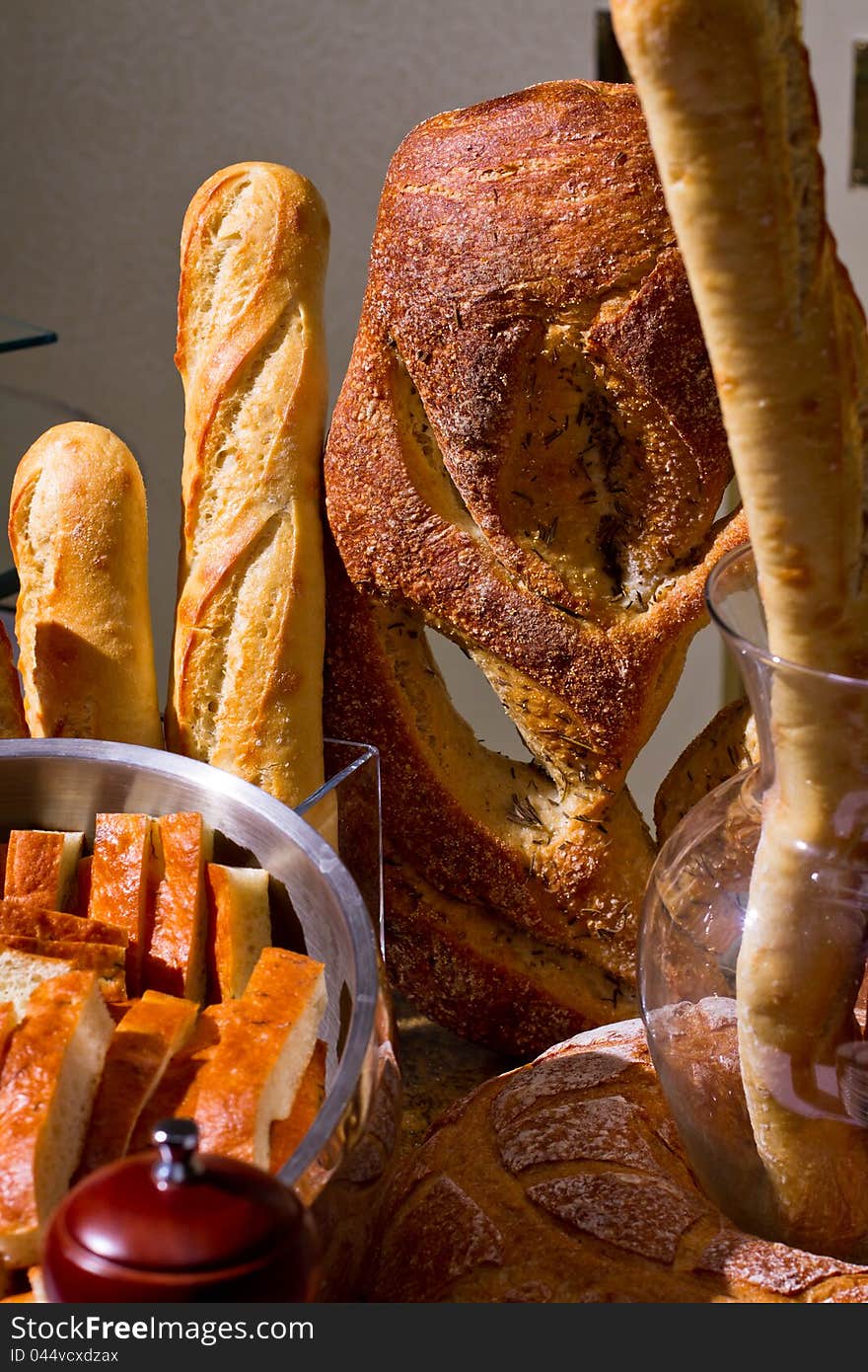 Loaves of different types of bread on display. Loaves of different types of bread on display.