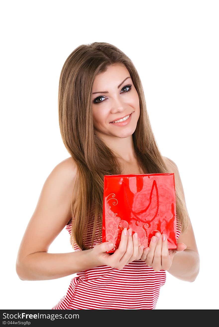 Portrait of beautiful young woman with gift