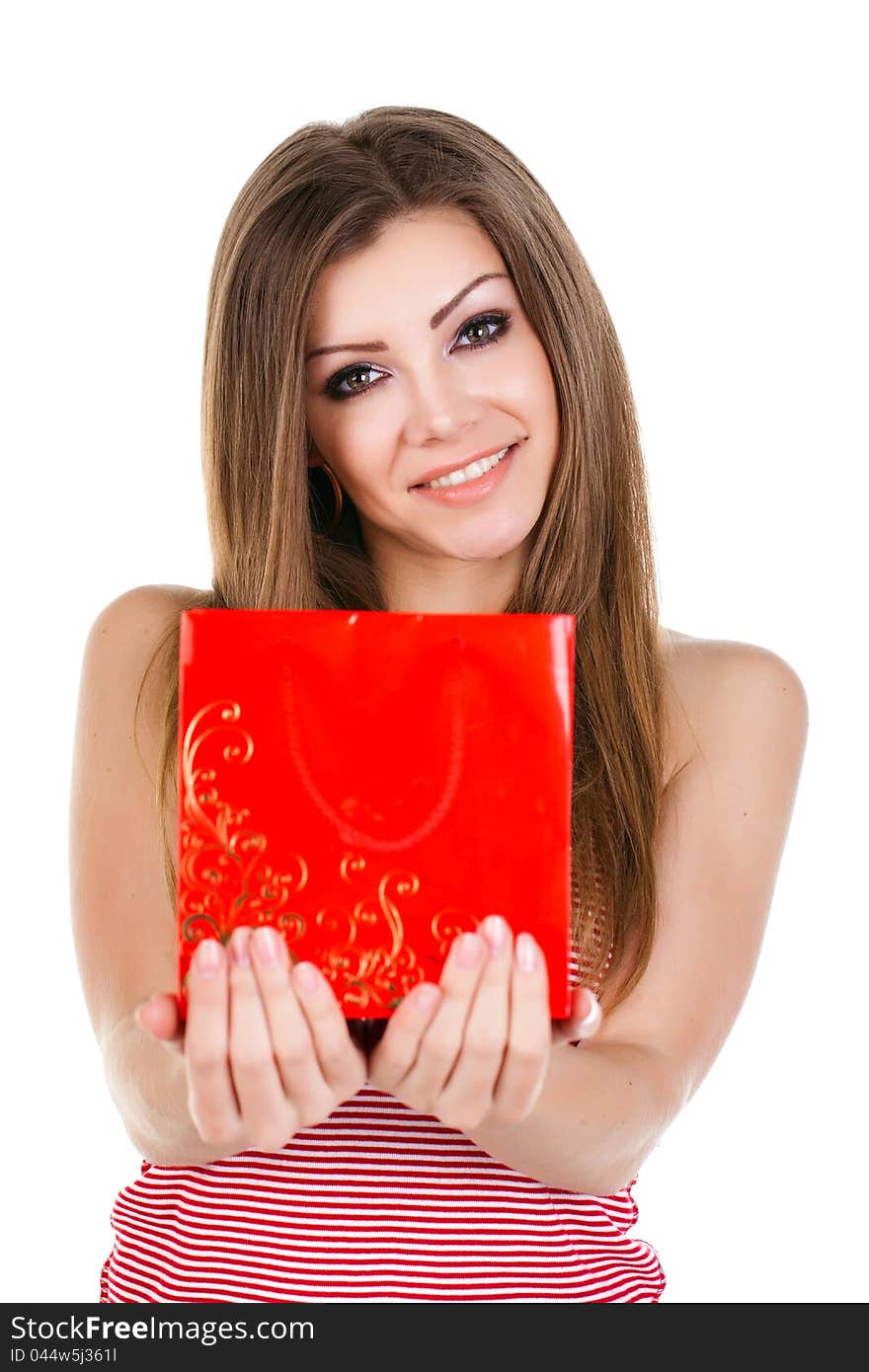 Portrait of beautiful young woman with gift