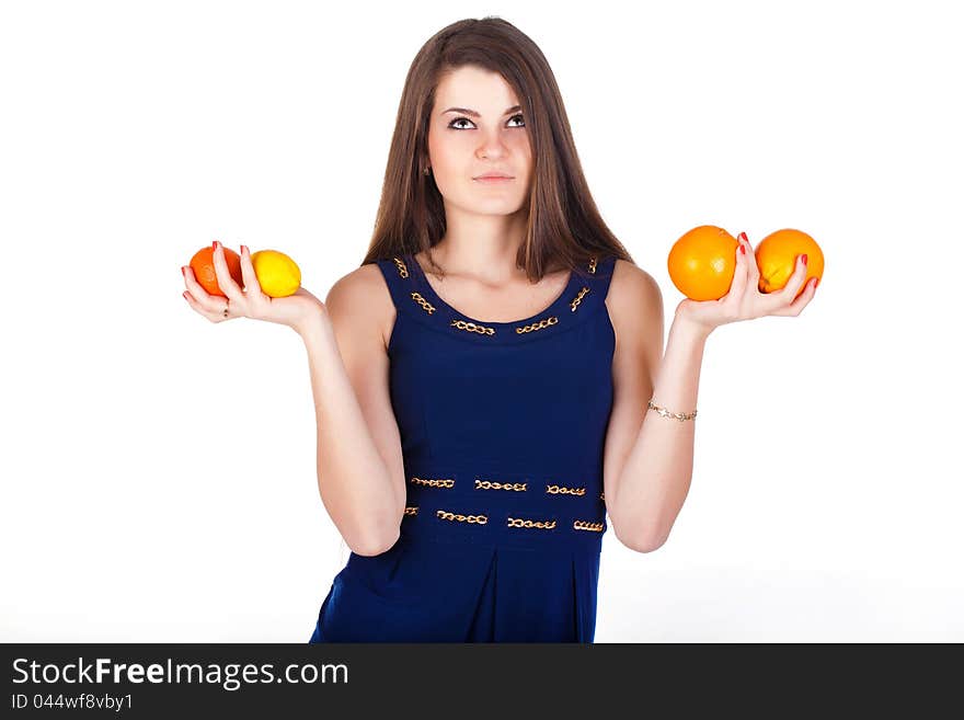 Pretty woman with straight hair with fruits