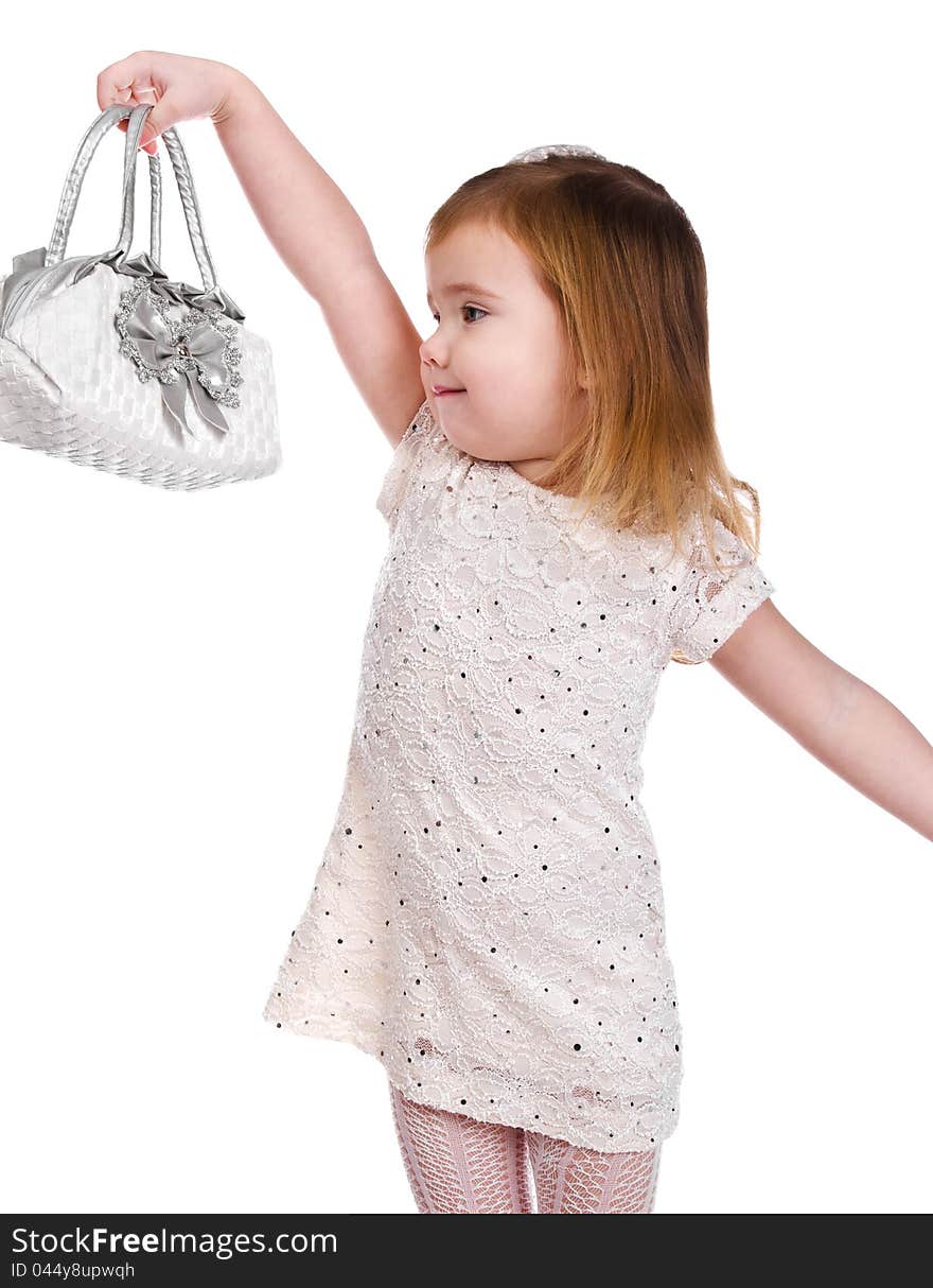 Portrait of cute little girl with a bag on a white