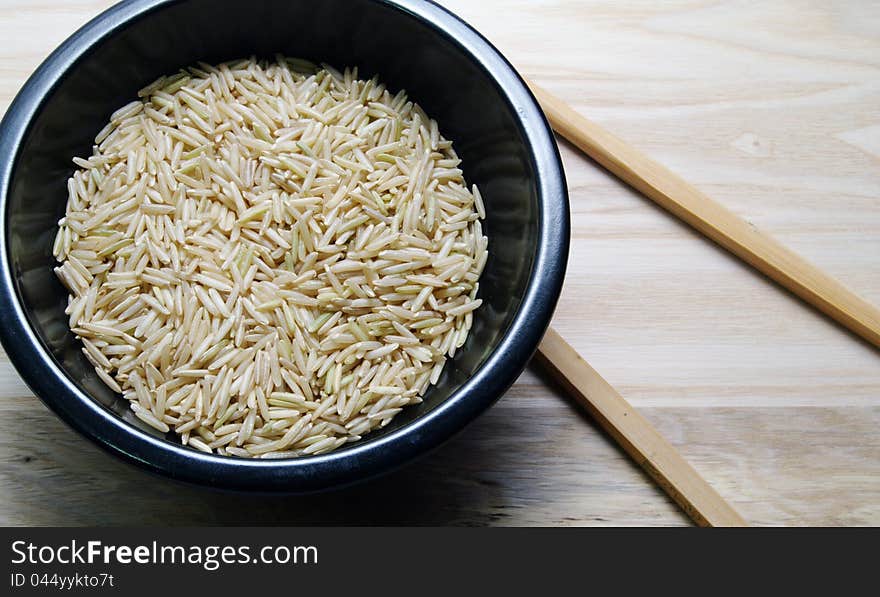 Basmati rice in a Black rice bowls with Chopsticks. Basmati rice in a Black rice bowls with Chopsticks