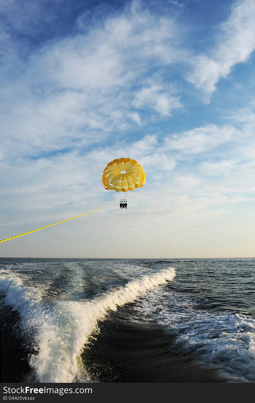 Parasail being pulled by a boat in the ocean