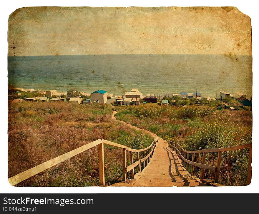 A staircase leads down to the sea. Old postcard, design in grunge and retro style. A staircase leads down to the sea. Old postcard, design in grunge and retro style