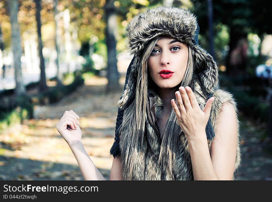 Model Of Fashion With The Winter Hat On