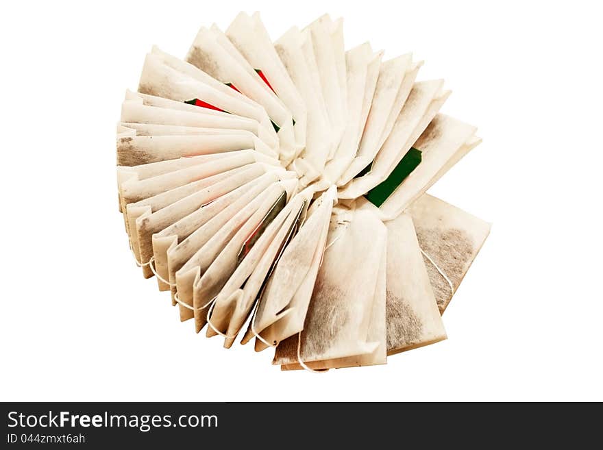 Bags of black tea on a white background