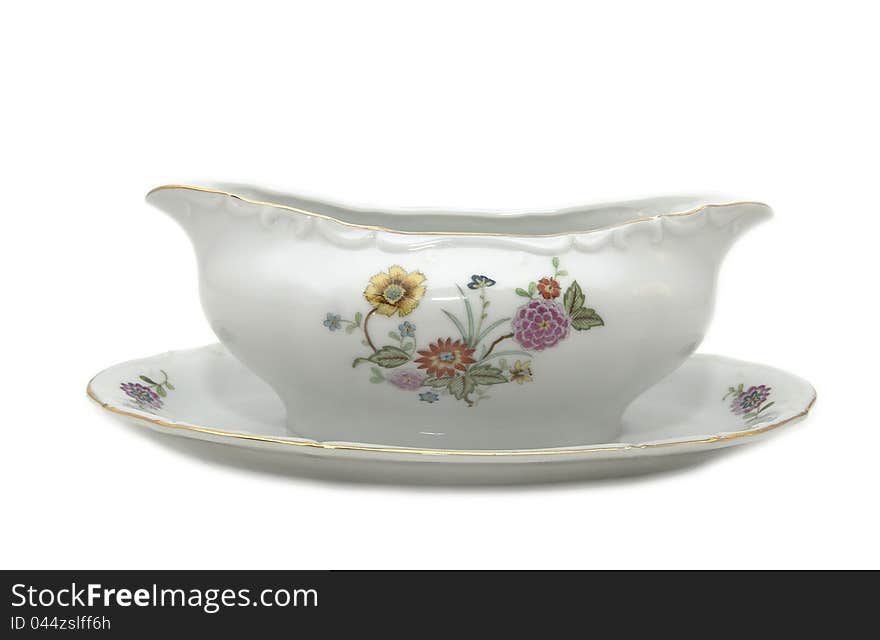 Old porcelain dishes on a white background. Old porcelain dishes on a white background