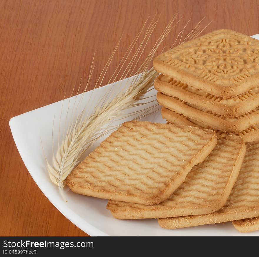 Fresh sweet biscuits with wheat spikelet