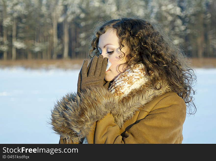 Cold in the winter the beautiful girls on the nature