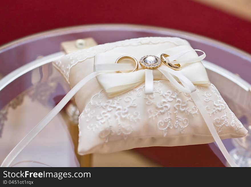 Wedding rings on the pillow during the process of wedding registration