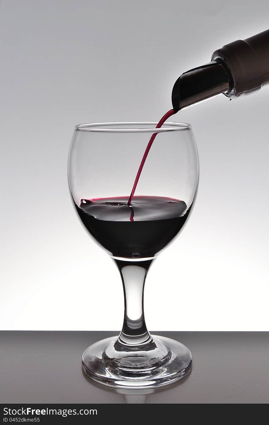 Red wine in little glass