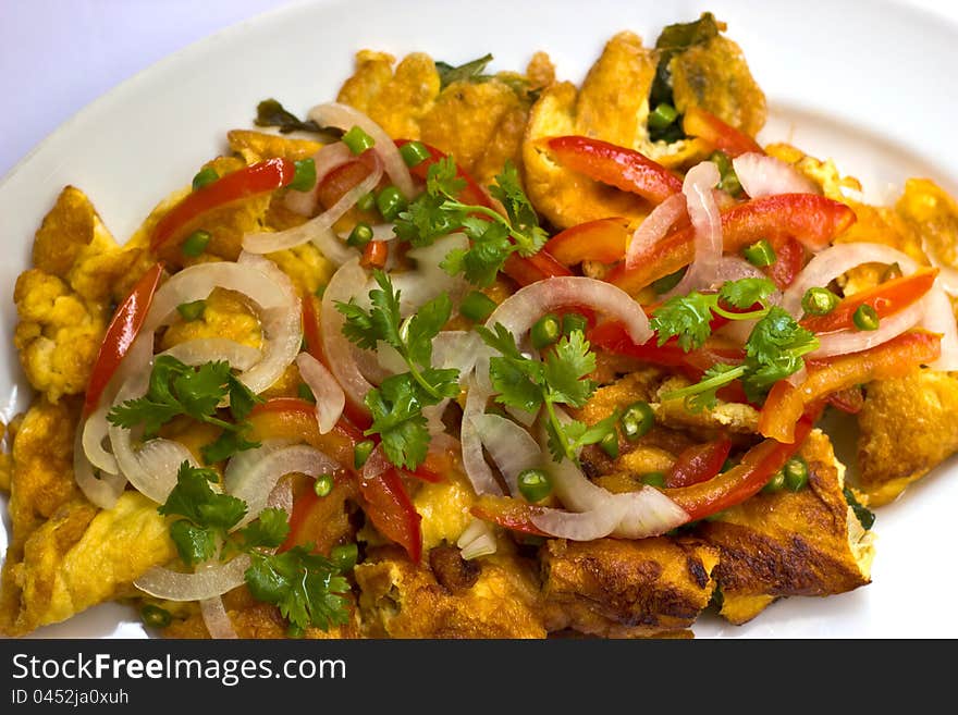 Close up of a plate of salad with chopped egg. Close up of a plate of salad with chopped egg