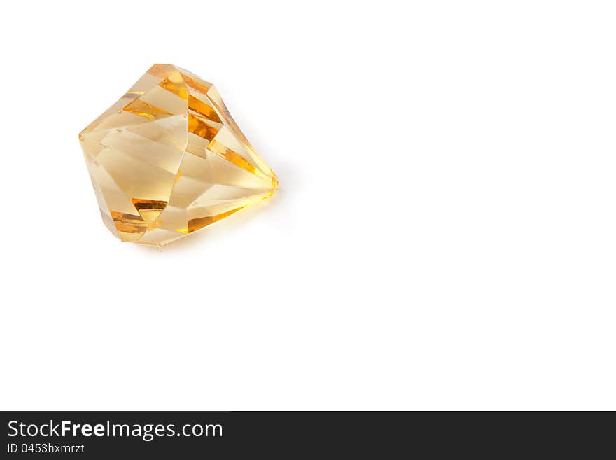 Fake diamond laying on white background