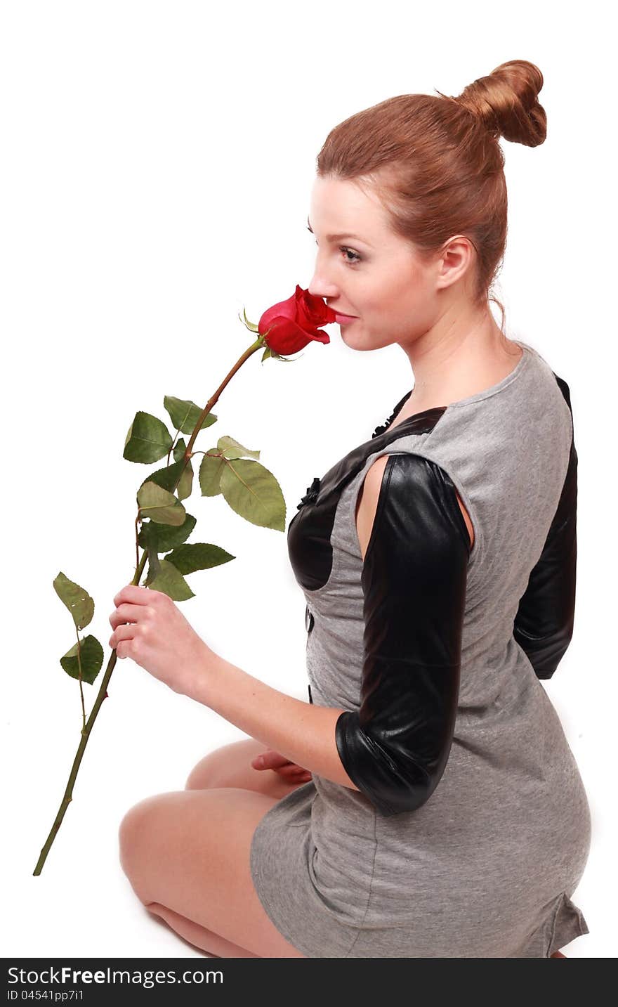 Portrait of light brown long hair girl with red rose over white background. Portrait of light brown long hair girl with red rose over white background