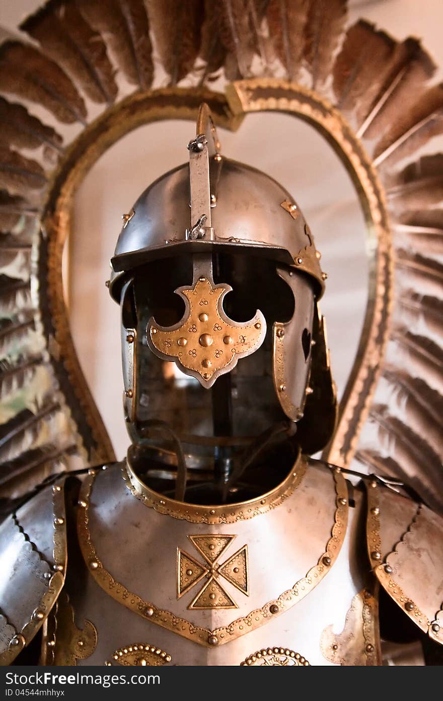 Ancient armor with feathers around the helmet