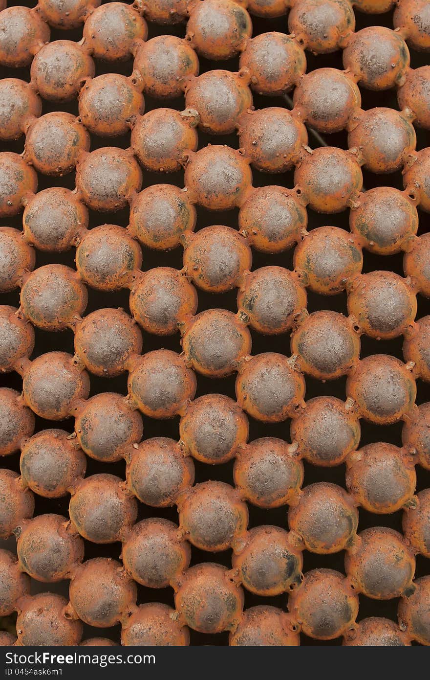 Old rusty iron metal ball on background. Old rusty iron metal ball on background