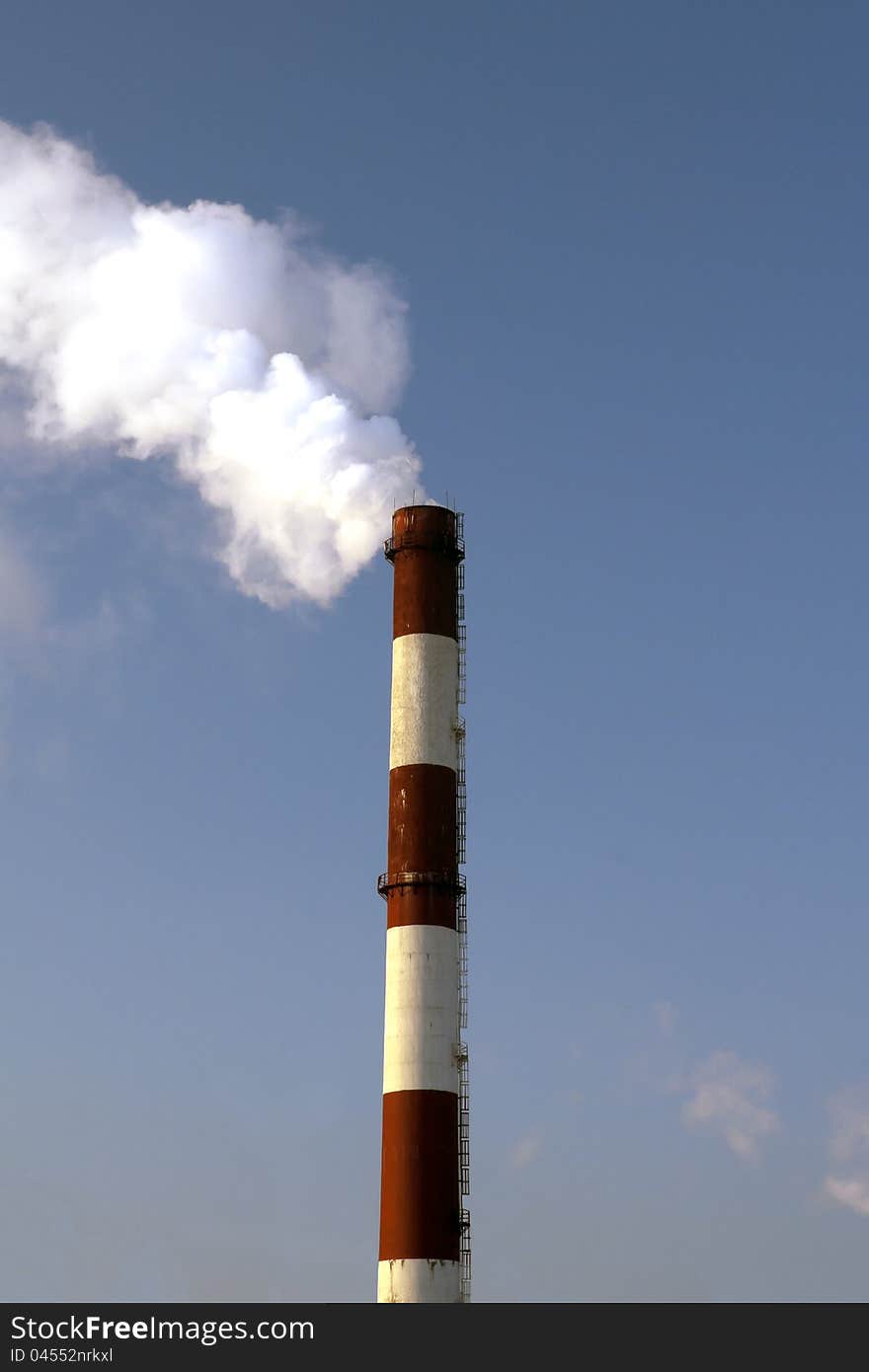 Smoke from a pipe of flues of power station