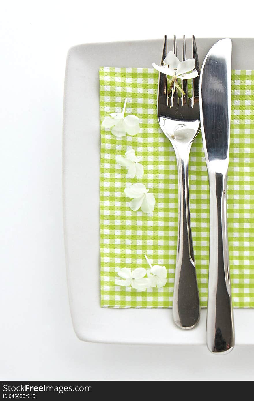 Spring table place setting with knife and fork