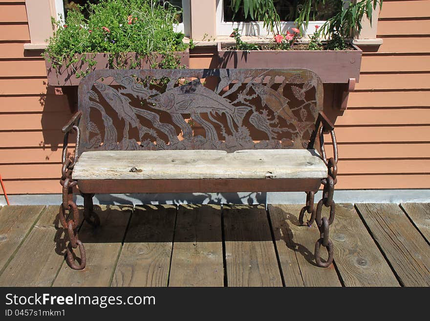 Bench on the boardwalk in Ketchikan Alaska. Bench on the boardwalk in Ketchikan Alaska