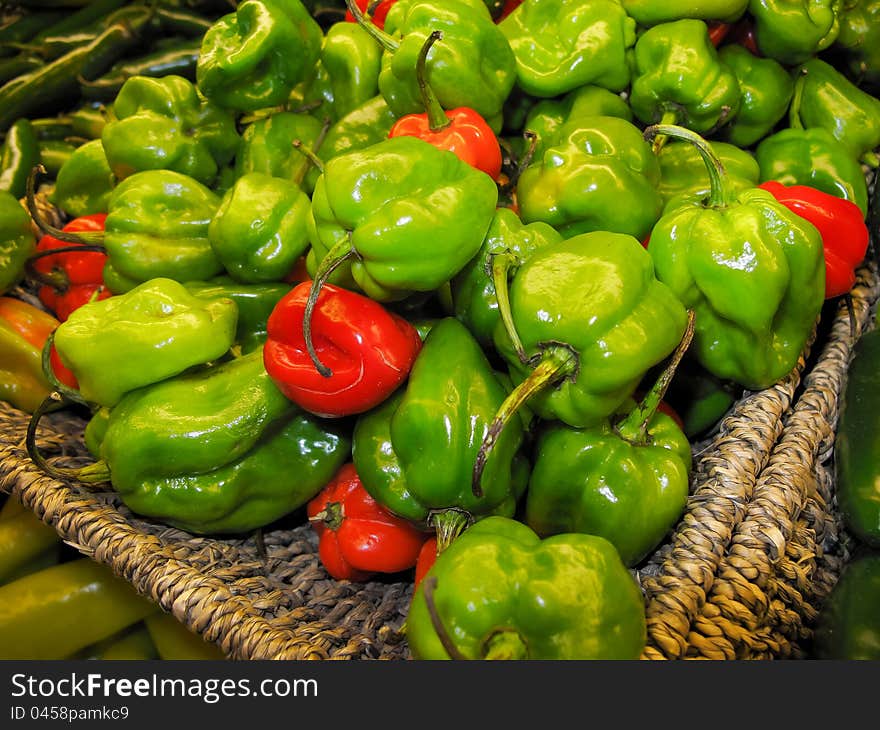 Green and red peppers in supermarket