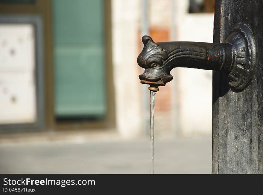 An old tap water at the street