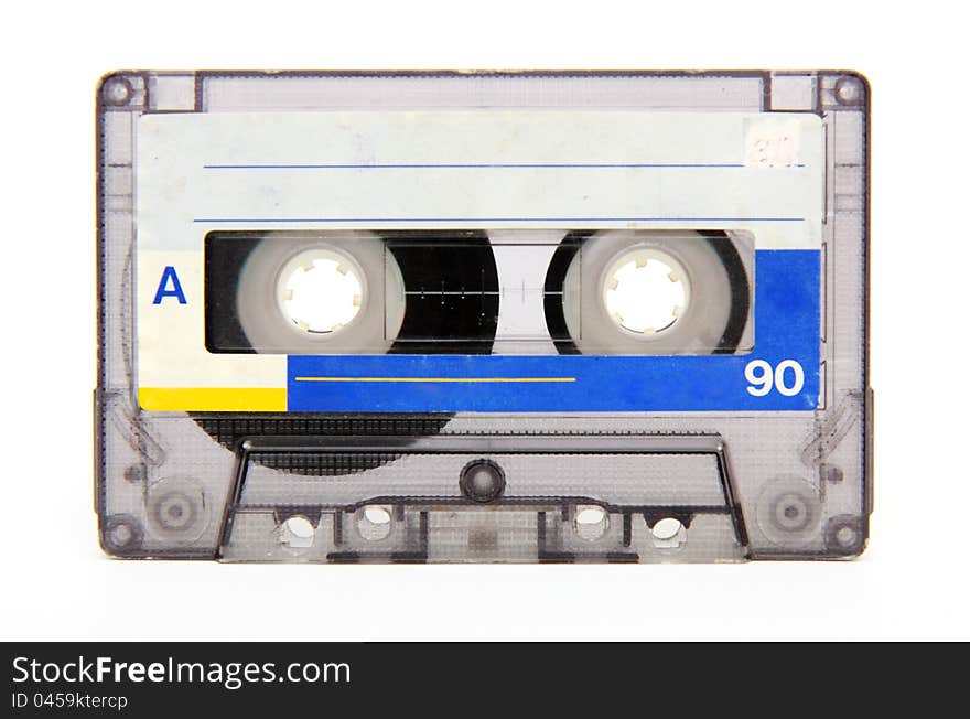 Close up of vintage audio tape on white background