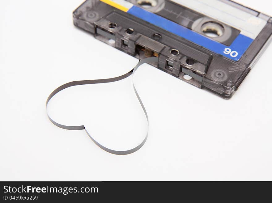 Close up of vintage audio tape on white background