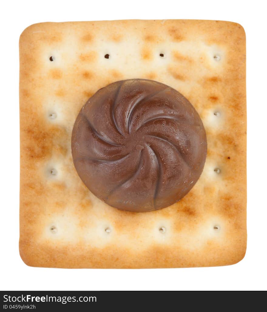 Round chocolate candy with crackers on a white background