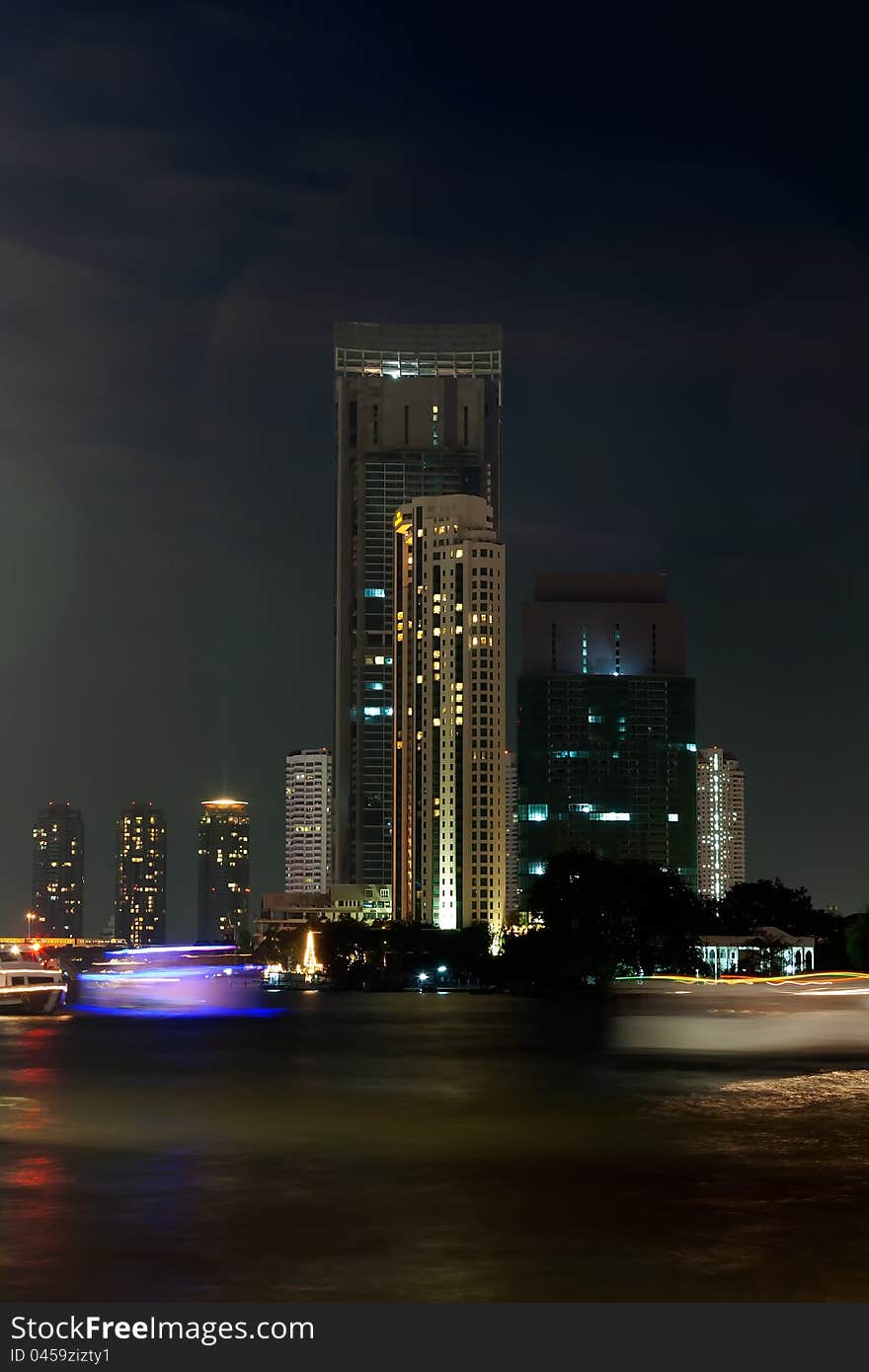 View of the Bangkok night across the river Chao Phraya