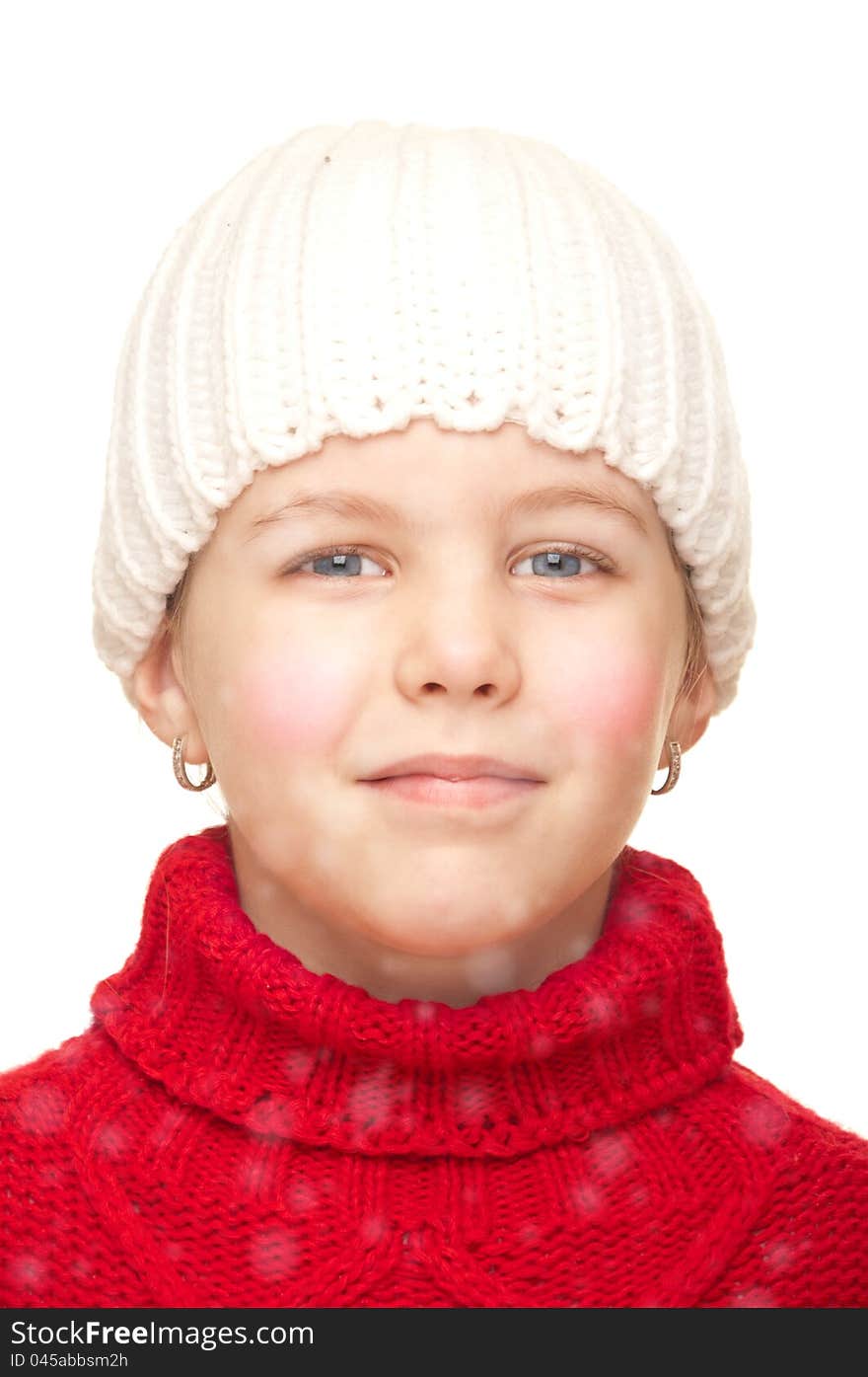 The girl in the snow with a white cap and a red turtleneck. The girl in the snow with a white cap and a red turtleneck