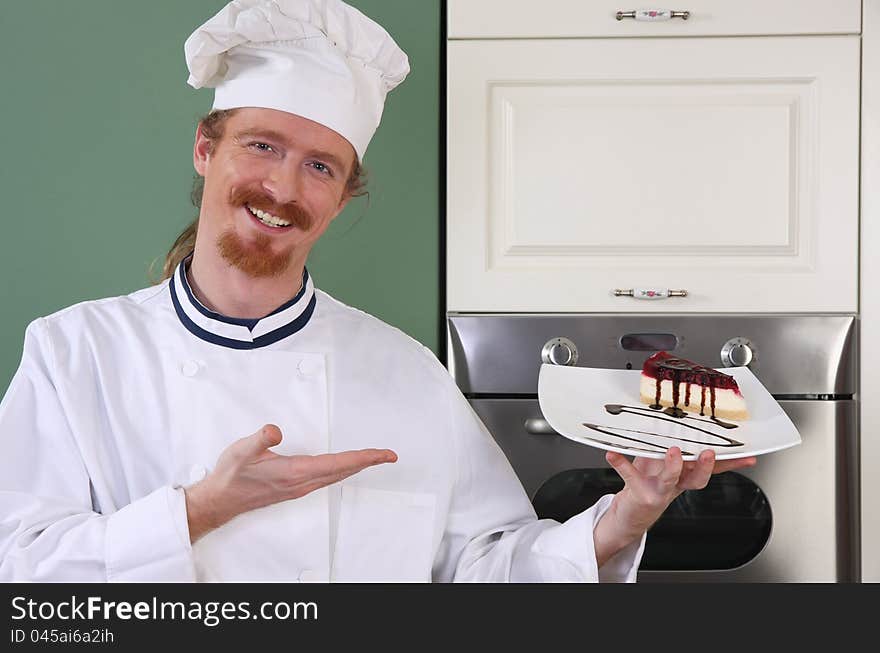 Young Chef With Piece Of Cake