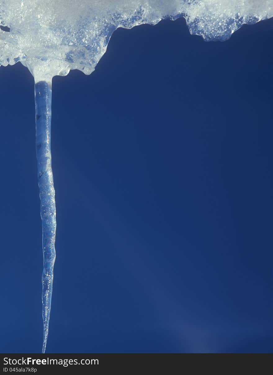 Winter background with icicle.