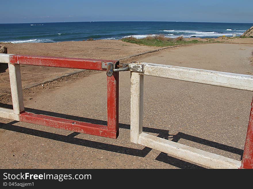 Closed and locked gates on the beach